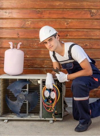 echnician using specialized equipment to detect and repair refrigerant leaks.